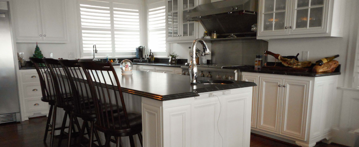 Beautifully Crafted White Custom Cabinets with Dark Top